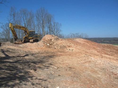 24 Beginning to Remove the Bluff Top