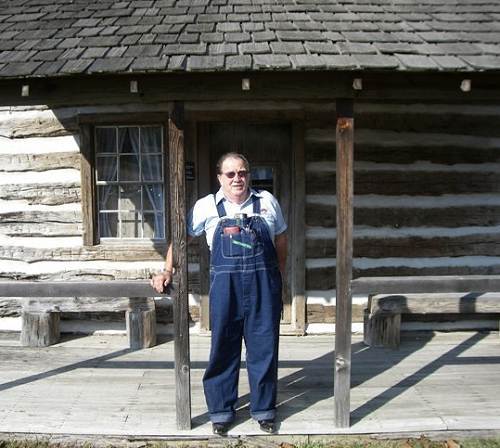 69 Gary Flaugher on porch of Lupardus Cabin