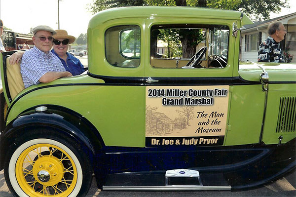 1931 Model A Ford owned and driven by Jack Brumley standing on Right