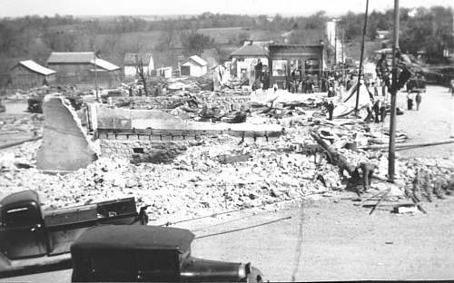  The brick building to the right of center is the one and only bank Iberia had.  The vault can be seen in the back left hand corner of the building.  At the back of the bank on Main Street, a garage and dentists office burned. 